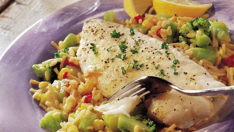 Fish And Rice Recipes
 Lemony Fish over Ve ables and Rice Recipe BettyCrocker