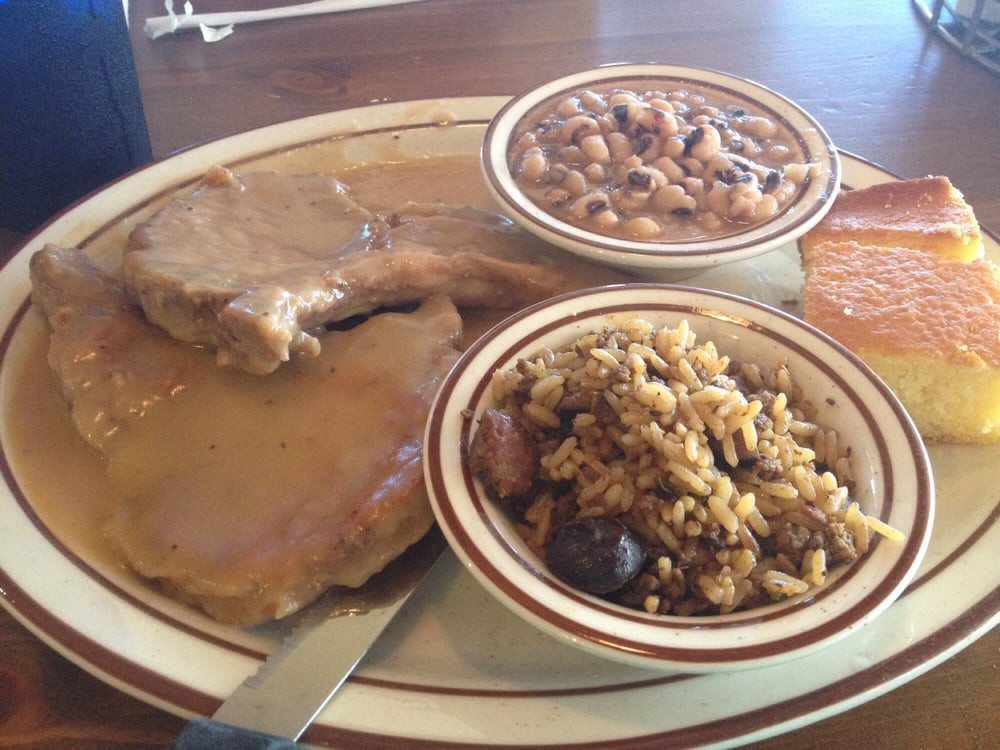 Smothered Pork Chops And Rice
 Smothered Pork Chops with cornbread black eyed peas and