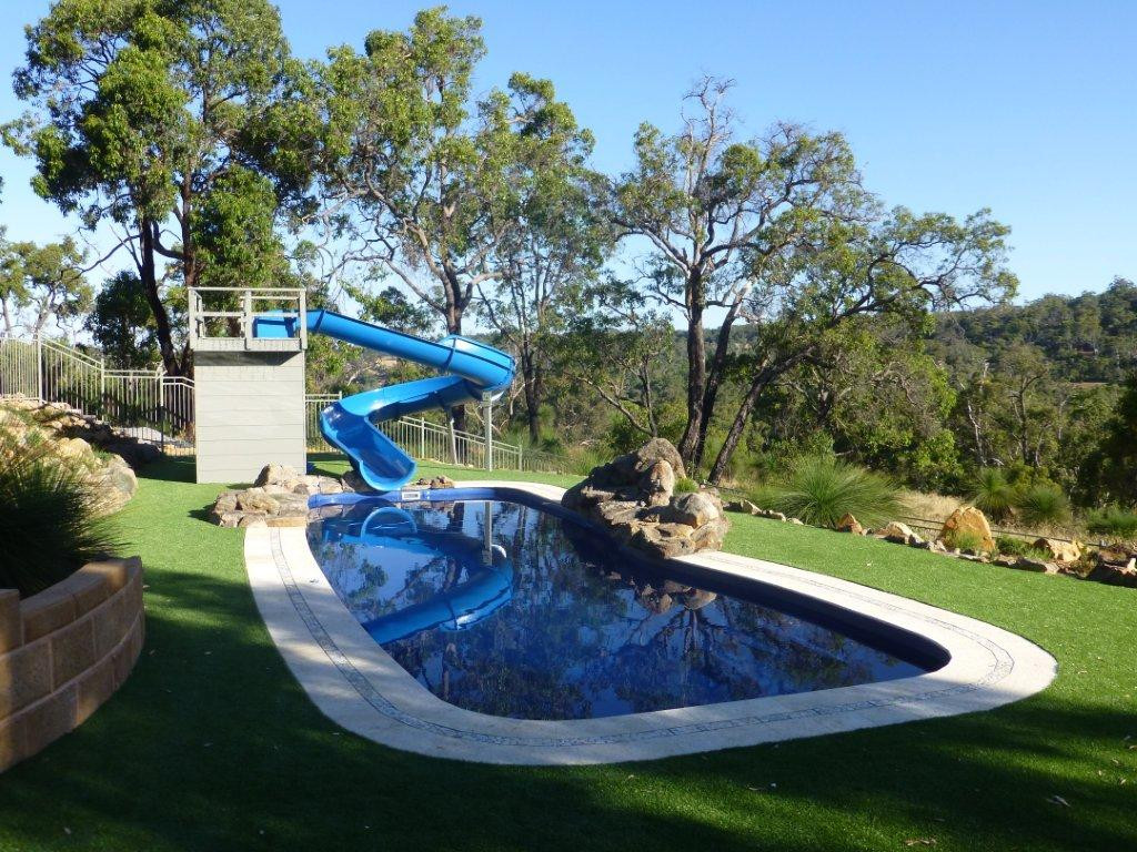 Backyard Pool Water Slide
 Types of Swimming Pool Slides to Add to Your Pool