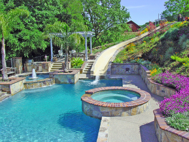 Backyard Pool Water Slide
 Water slide and Fountain Swimming Pool and Retaining