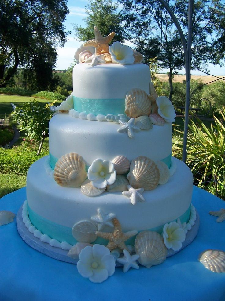 Beach Theme Wedding Cakes
 Fondant cake with white chocolate shells and gumpaste