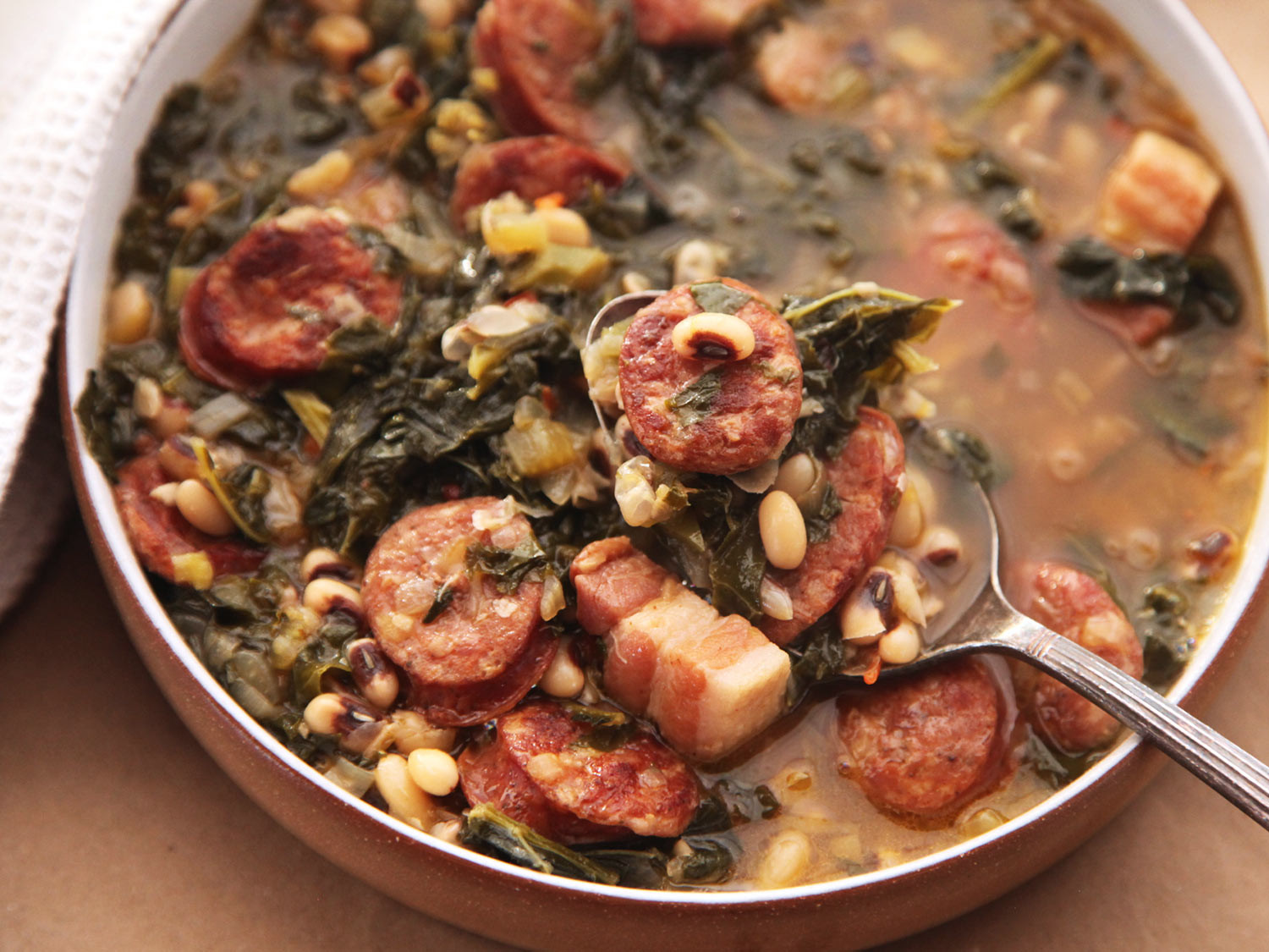 Black Eyed Pea Stew
 Make These Black Eyed Peas With Kale and Andouille for a