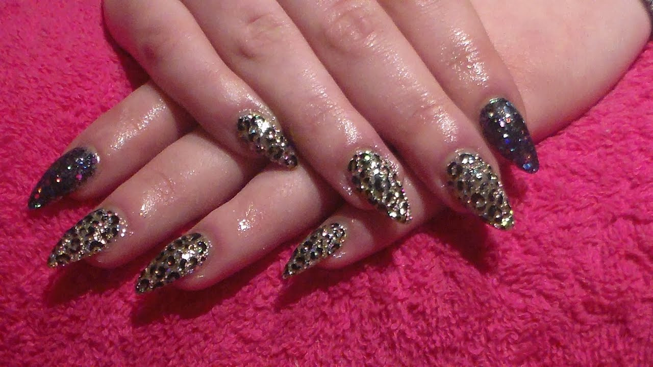 Black Glitter Acrylic Nails
 Black and Gold Glitter with leopard print Acrylic nails