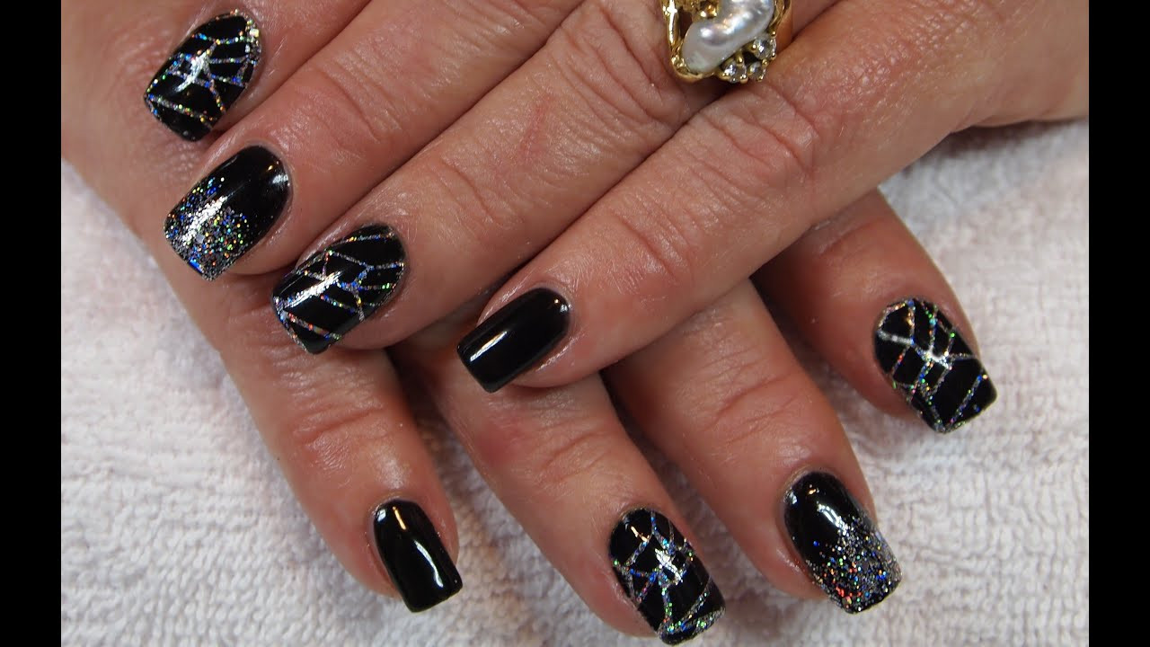 Black Silver Nail Designs
 Stunning Black Gel Nails with Holo Silver Glitter