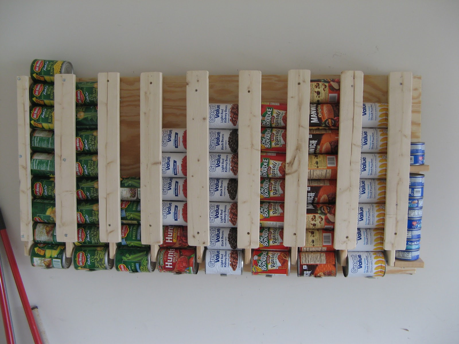 Can Storage Rack DIY
 16 DIY Canned Food Organizers