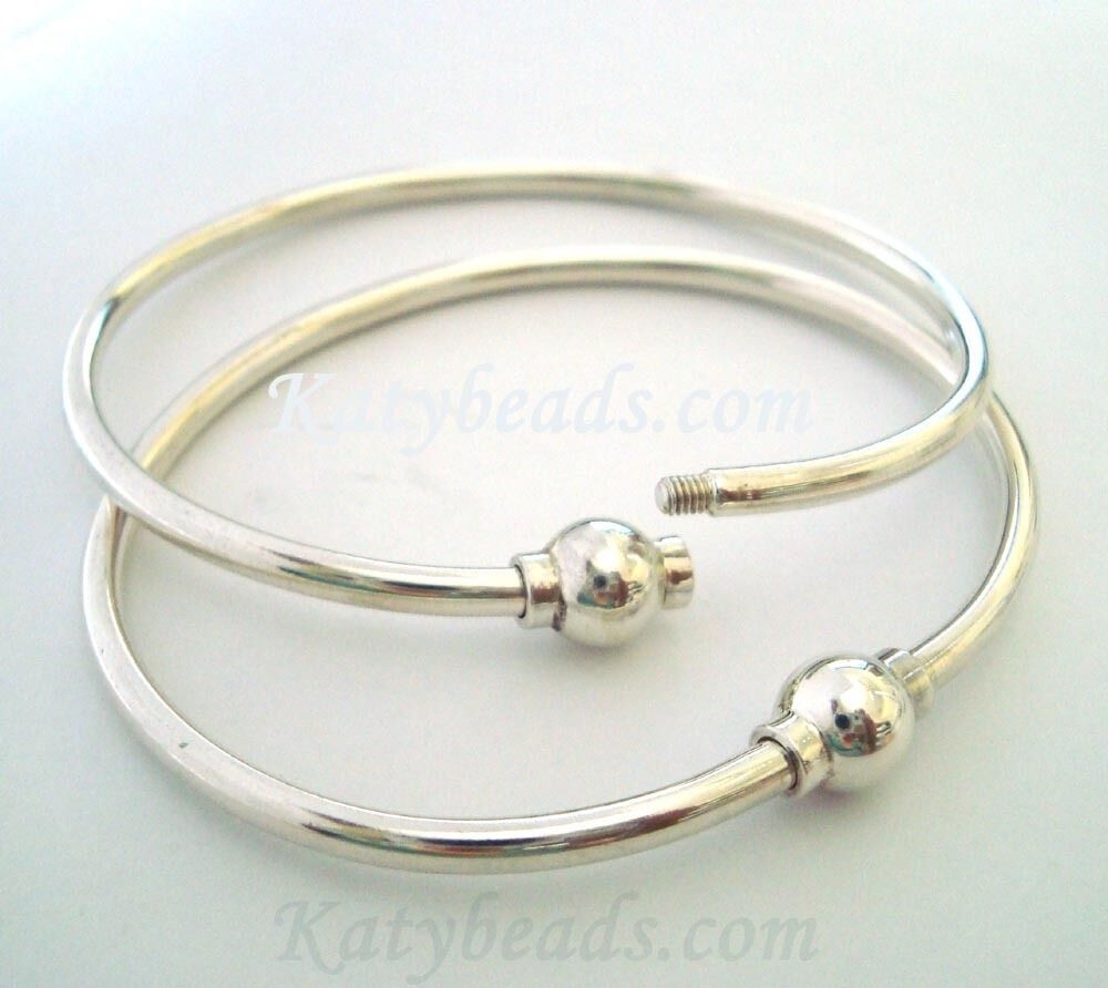 Cape Cod Bracelets
 7" 925 Plain sterling silver charm bangle screw ball clasp