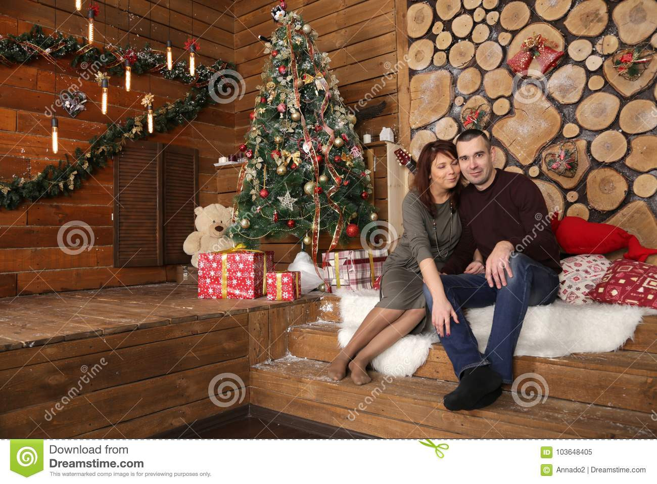 Christmas Gift Ideas For Young Married Couples
 Family Couple At Christmas Tree With Gifts Stock Image