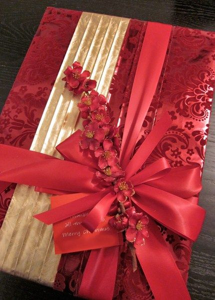 Christmas Gift Wrapping Ideas Elegant
 Beautiful red and gold with artificial flowers Very