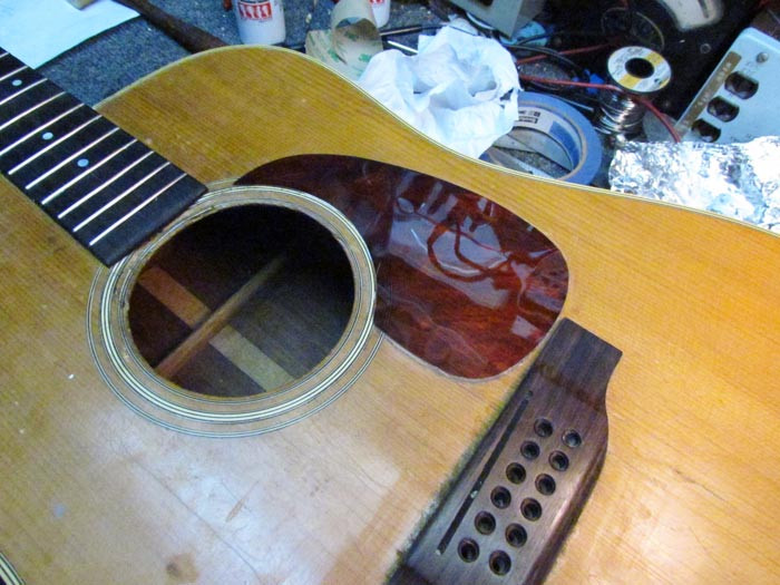 DIY Acoustic Guitar Crack Repair
 Making a Tortoloid Pickguard for Martin D 12 28 Crawls