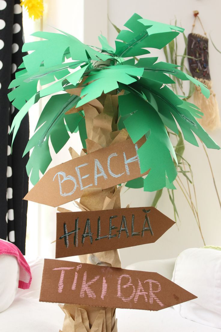 DIY Cardboard Decor
 Paper palm tree for luau party decoration with pizza