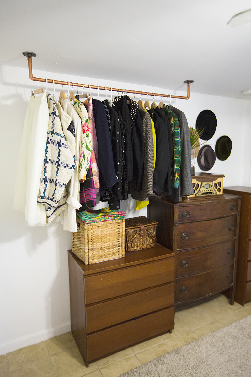 DIY Clothing Racks
 Hanging Copper Pipe Clothing Rack DIY – A Beautiful Mess