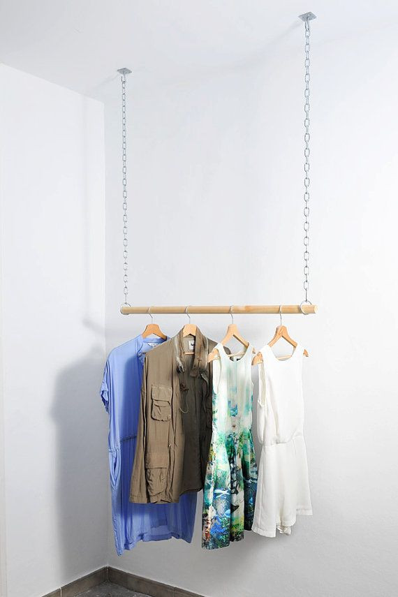 DIY Hanging Clothes Rack
 Wooden Floating Hanging Clothes Rack van AvelereDesign op