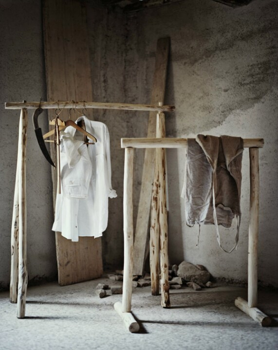 DIY Hanging Clothes Rack
 Distracted by Design