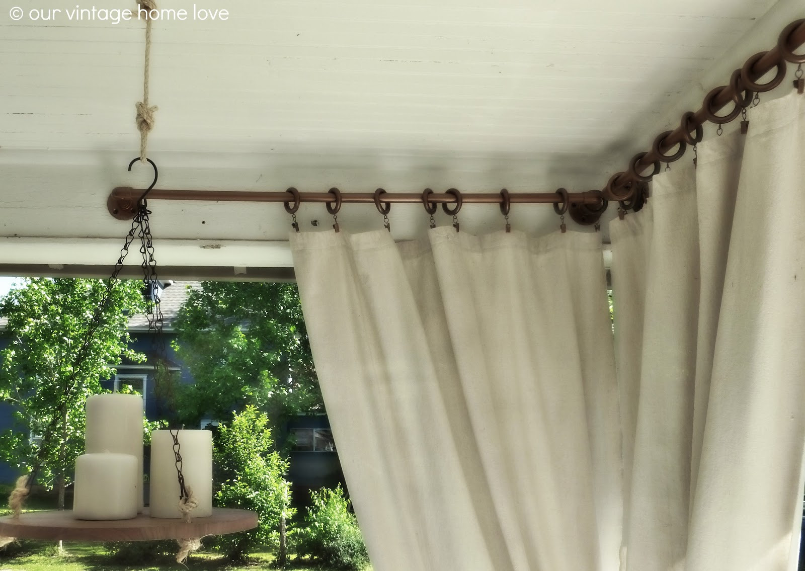 DIY Outdoor Curtain Rods
 vintage home love Back Side Porch Ideas For Summer and An
