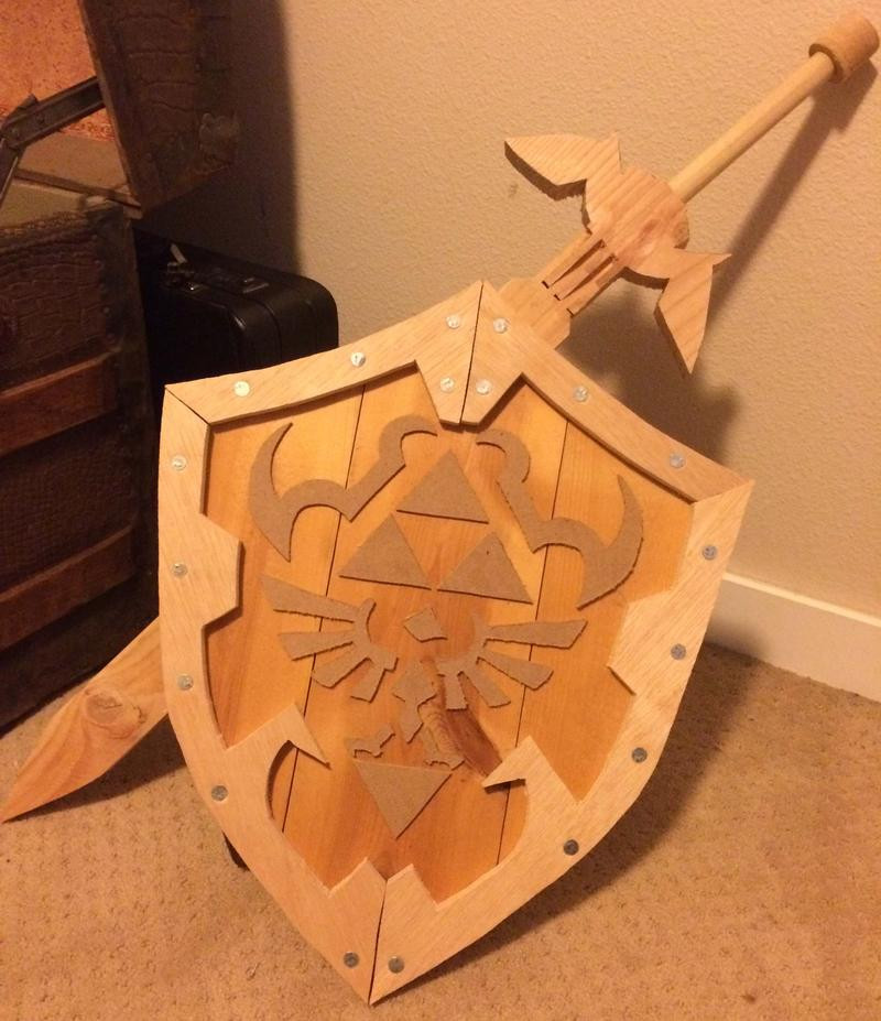 DIY Wooden Shield
 Wooden Hylian Shield and Master Sword by chikeon123 on