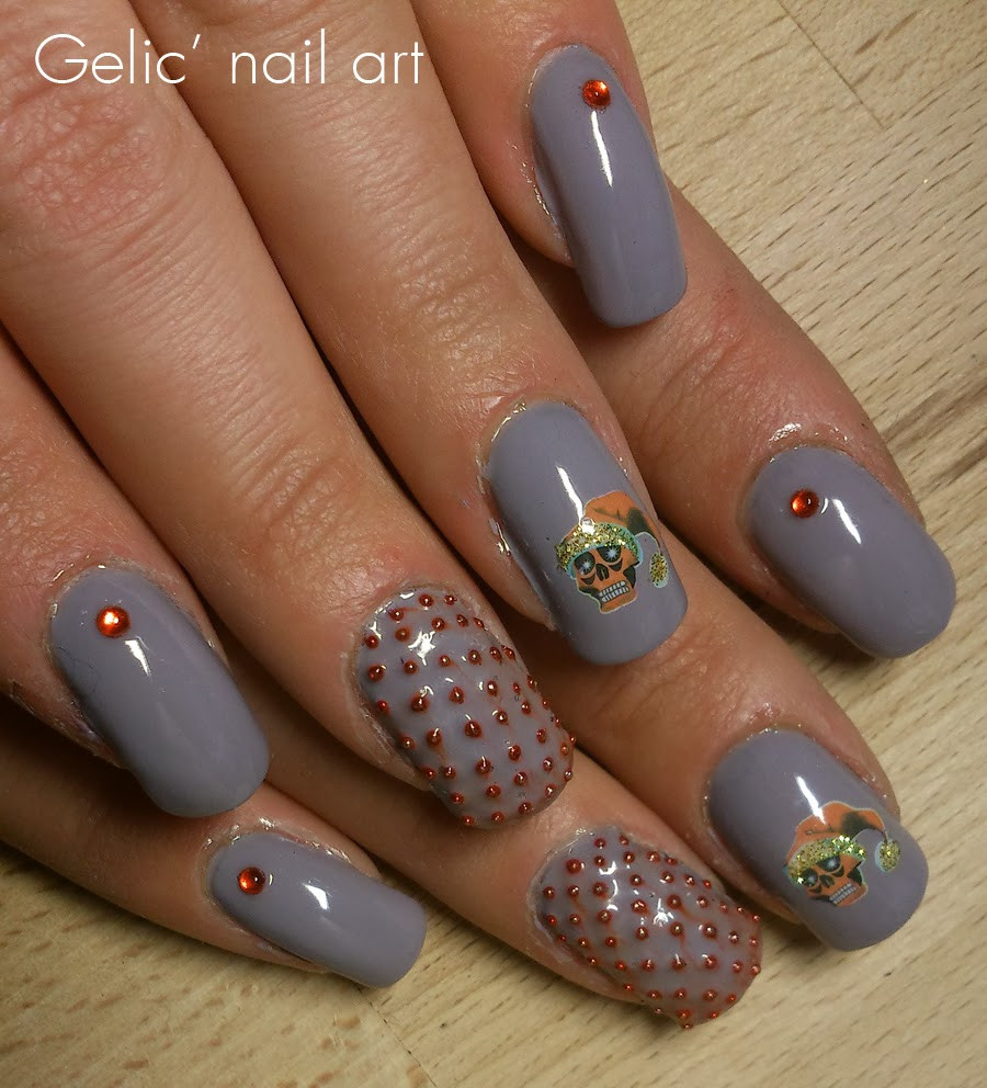 Edgy Nail Designs
 Gelic nail art Edgy Christmas nail art in gray and red
