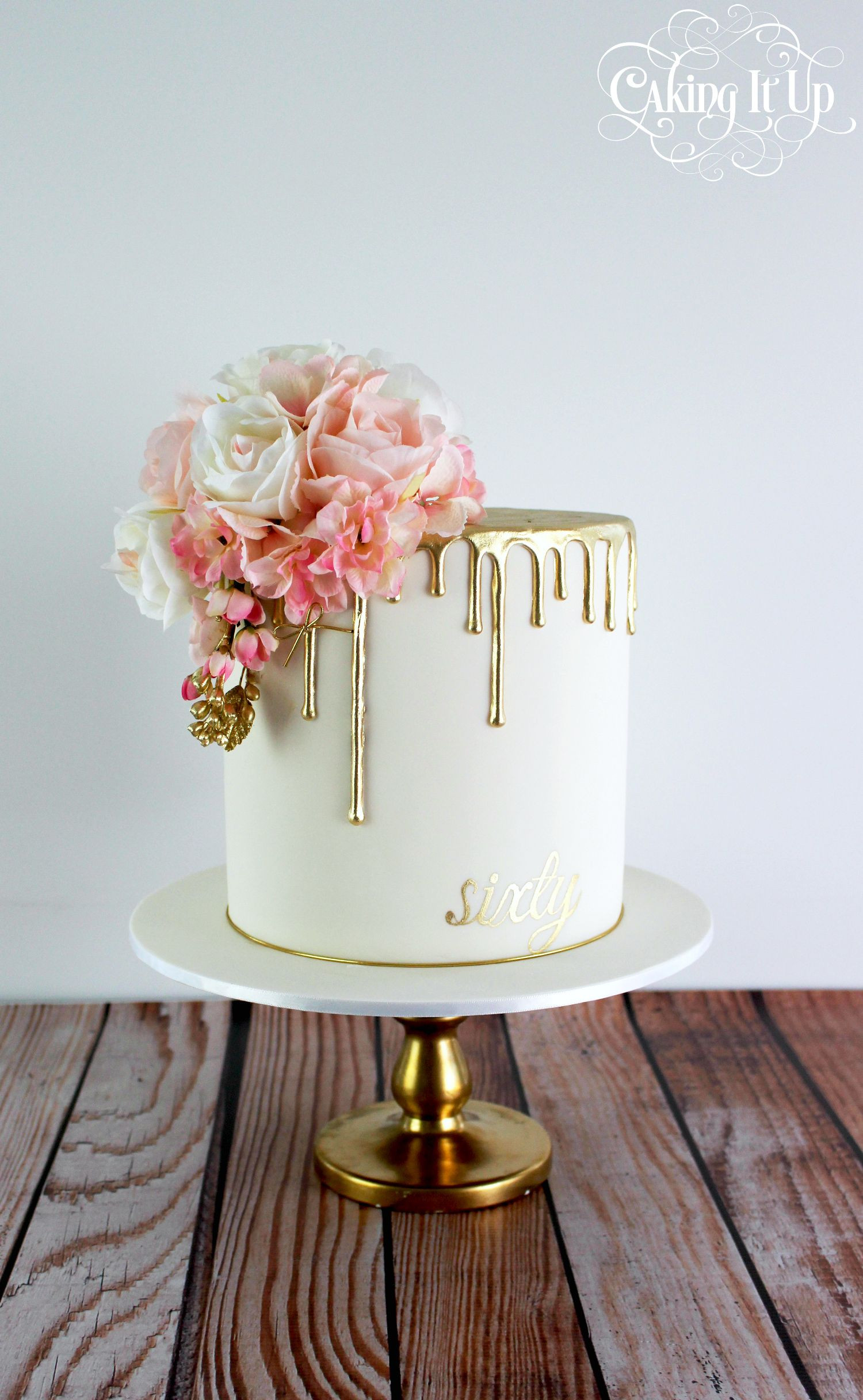 Elegant Birthday Cakes
 Classy and elegant golden drizzle 60th birthday cake with