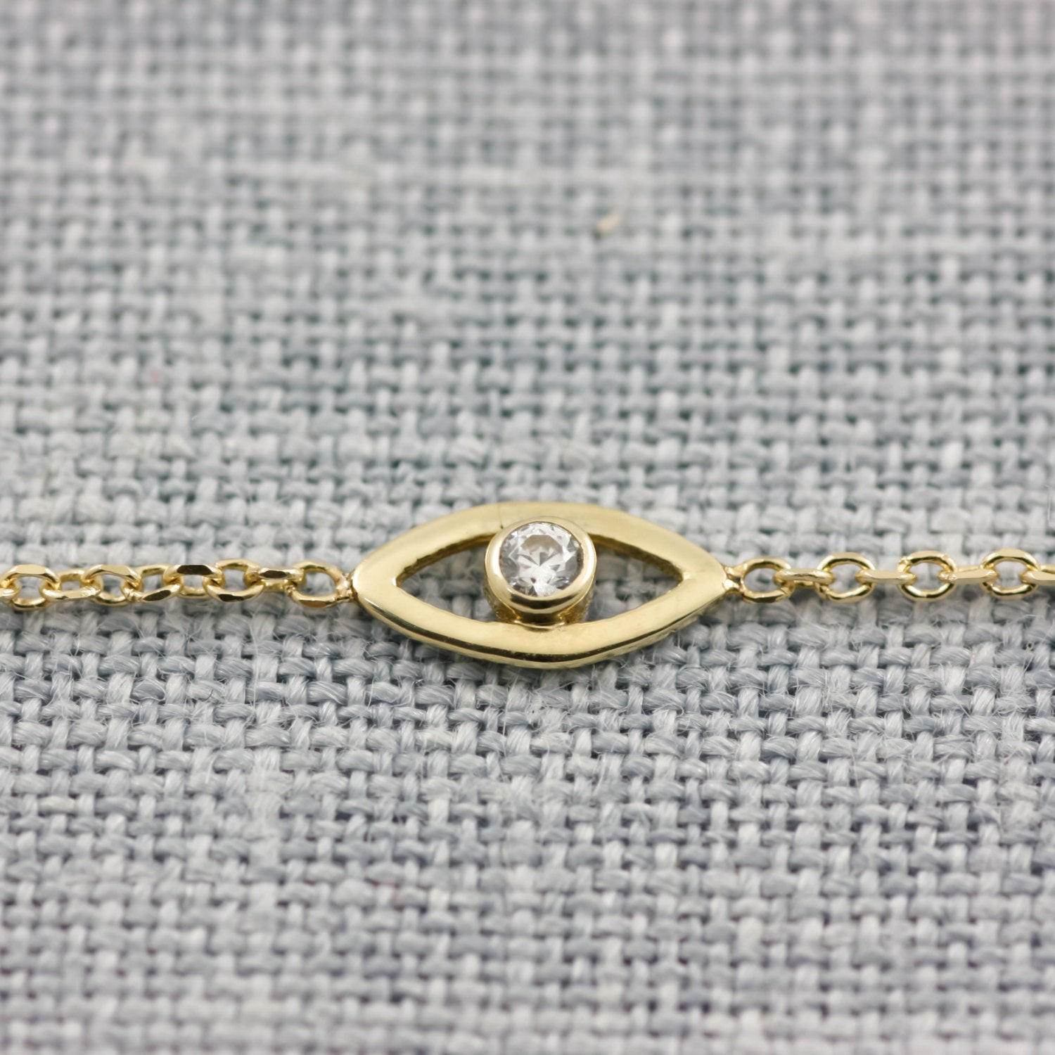 Evil Eye Bracelet Gold
 Evil eye 14K gold bracelet white diamond by KyklosJewelryLab