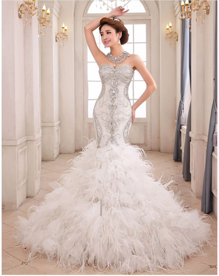 Feather Wedding Dress
 21 best Feathered Wedding Dresses images on Pinterest
