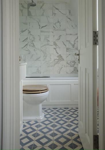 Geometric Bathroom Tiles
 Geometric Tile Floor Transitional bathroom