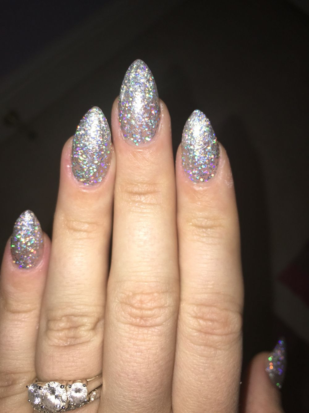 Glitter Almond Nails
 Silver glitter almond stiletto nsi acrylic nails