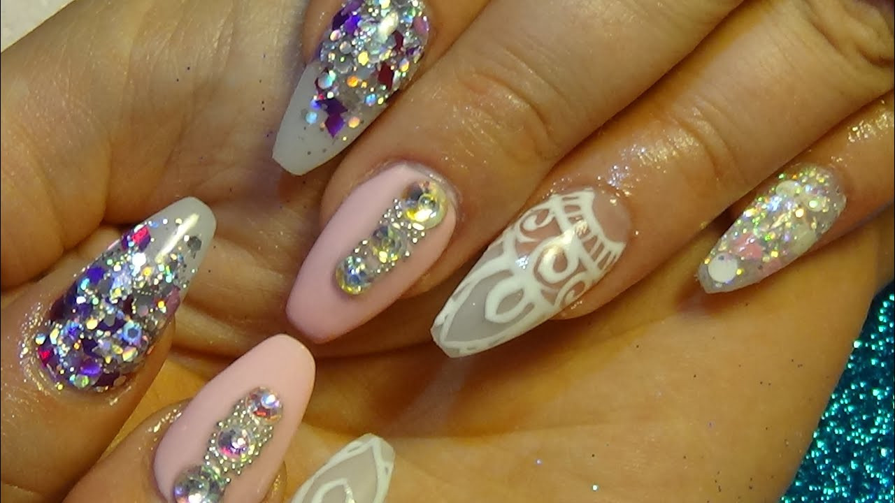 Glitter Fake Nails
 beautiful pink & glitter acrylic nails with hand painted