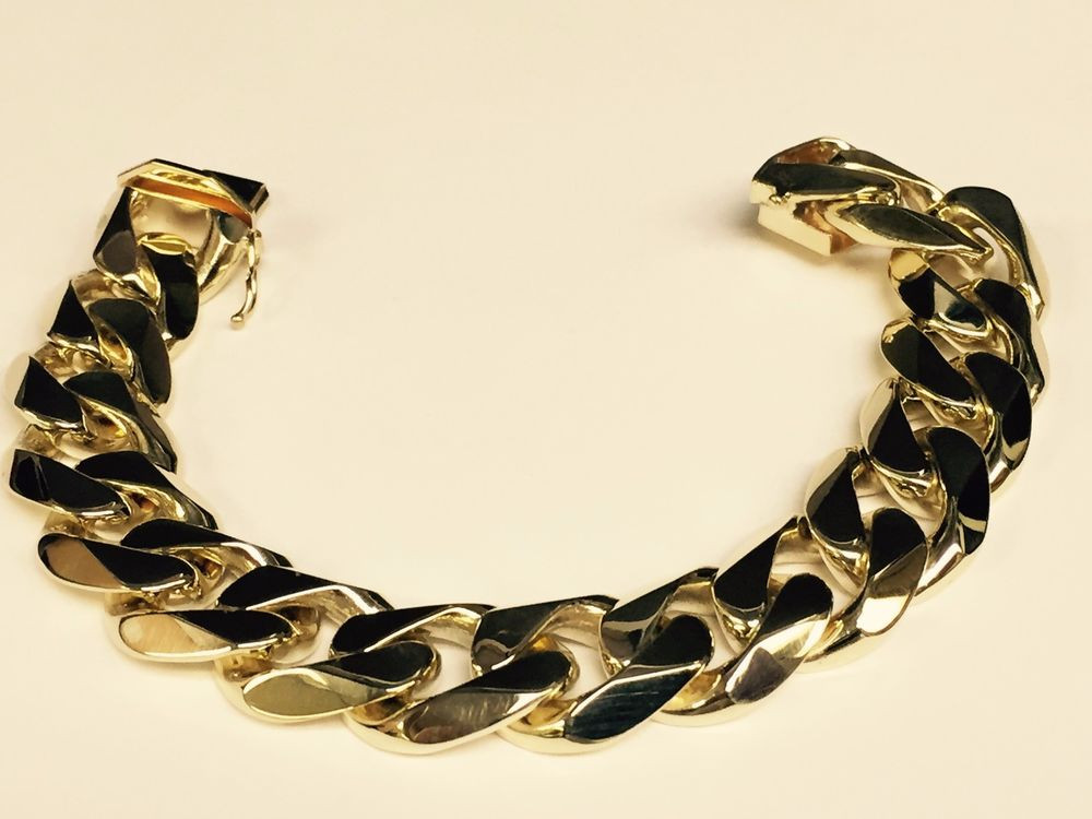 Gold Mens Bracelets
 10kt solid gold Curb Link mens bracelet 10" 140 Grams 17MM