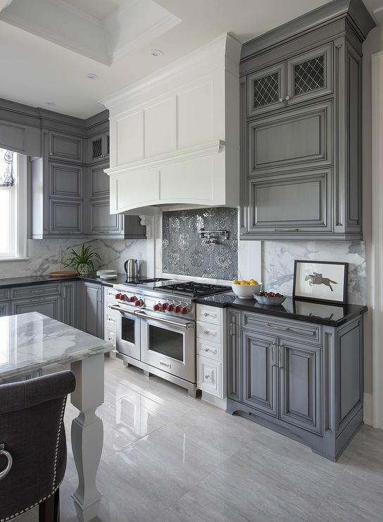 Gray Tile Kitchen
 White Kitchen Hood with Dark Gray Mosaic Cooktop
