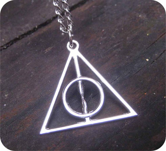 Harry Potter Deathly Hallows Necklace
 Items similar to Harry Potter Deathly Hallows Symbol