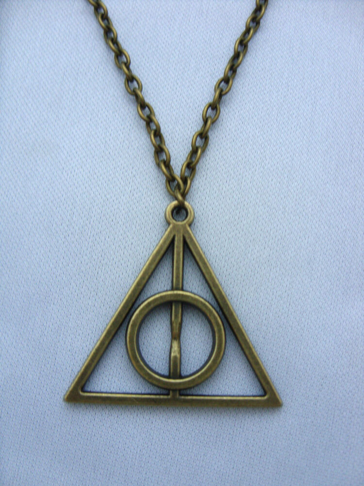 Harry Potter Deathly Hallows Necklace
 A Bronze Tone Harry Potter The Deathly Hallows Charm
