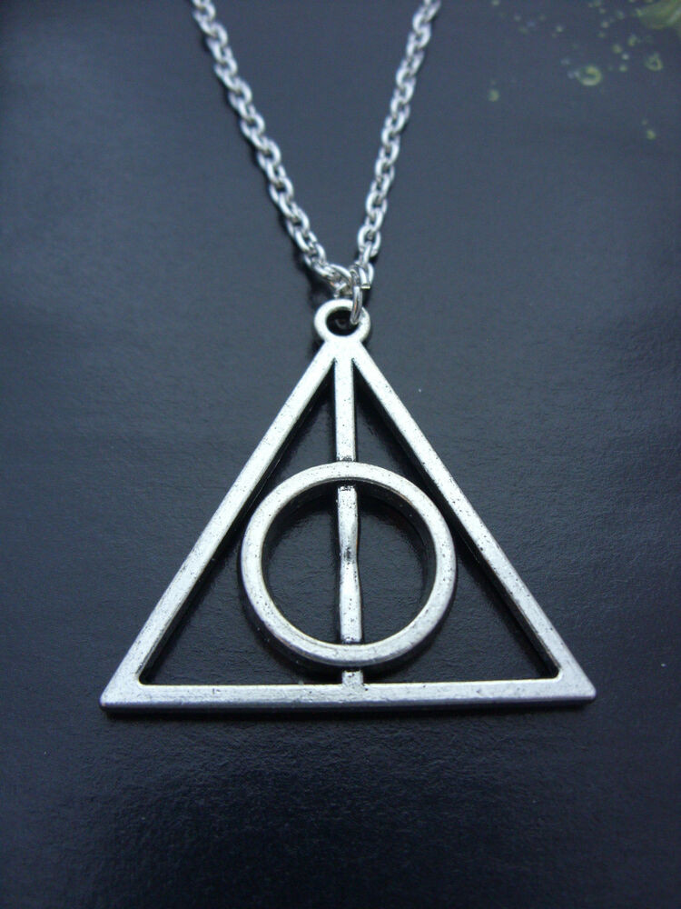Harry Potter Deathly Hallows Necklace
 A Silver Tone Harry Potter The Deathly Hallows Charm