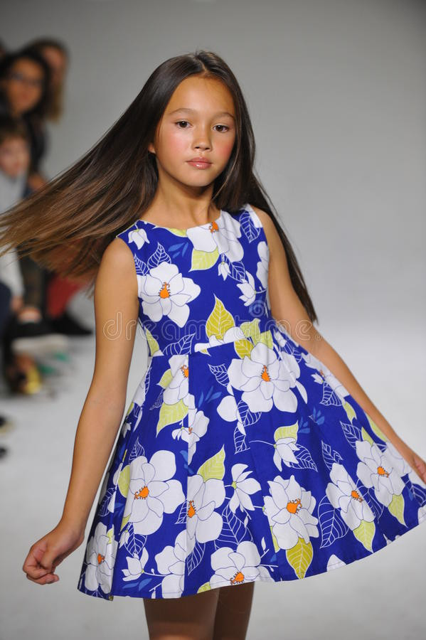 Kids Fashion Week
 NEW YORK NY OCTOBER 19 A Model Walks The Runway During