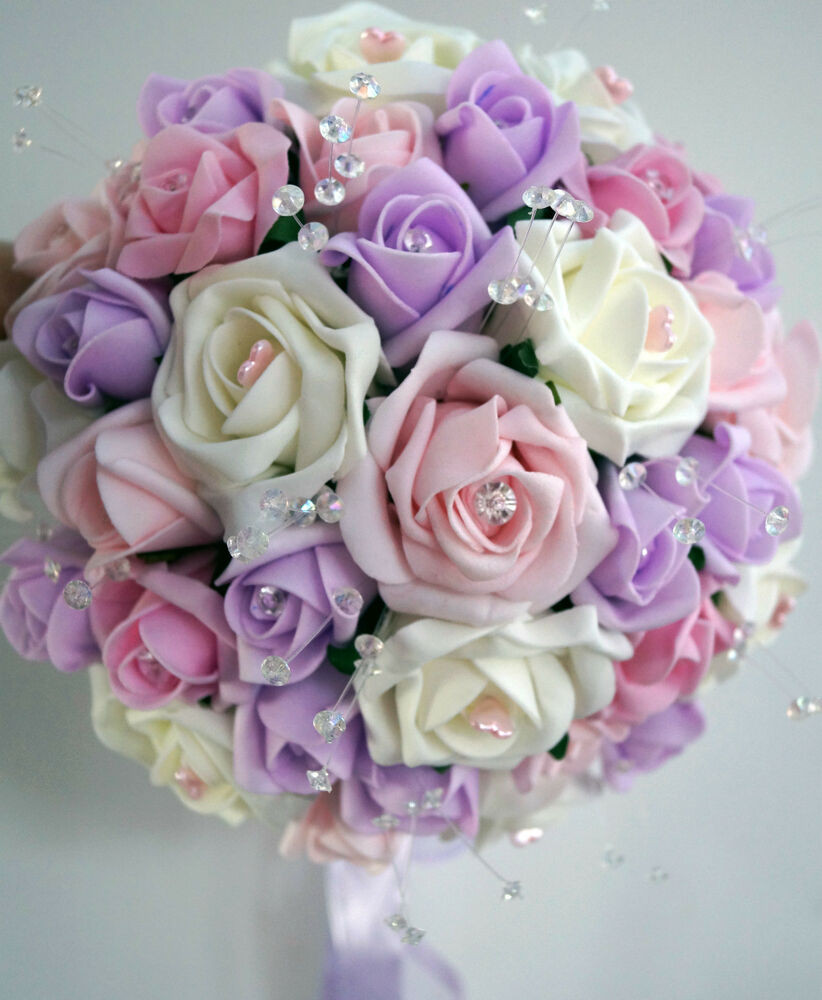 Lilac Wedding Flowers
 Brides Bridesmaids buttonholes Wedding Bouquet Flowers