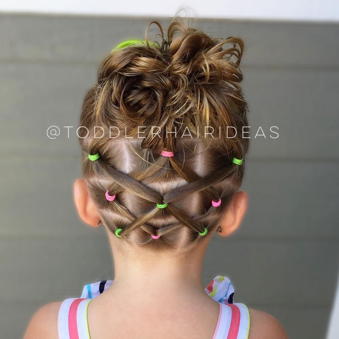 Little Girl Hairstyles With Rubber Bands
 Elastics ponies criss crossed up to a messy bun We are in