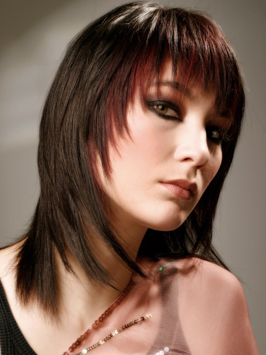 Long Tapered Haircuts
 Tapered haircut with long tendrils along the sides of the face