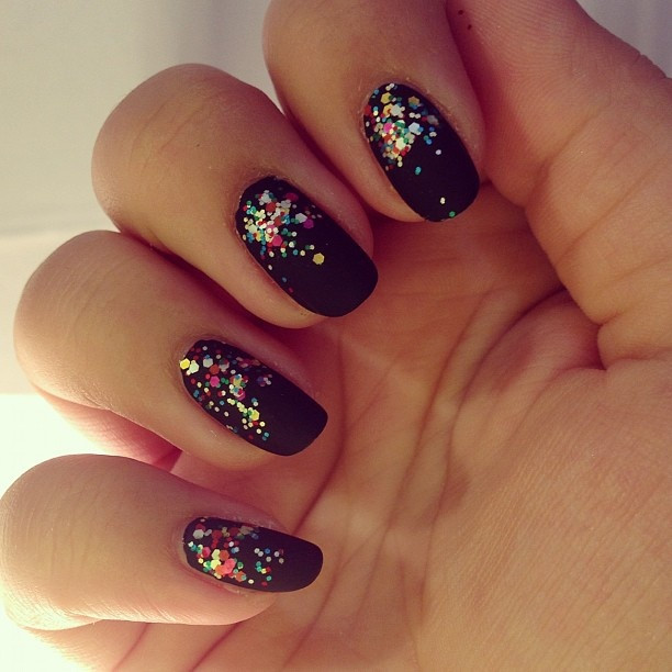 Matte Black Nails With Glitter
 Matte black with confetti glitter nails