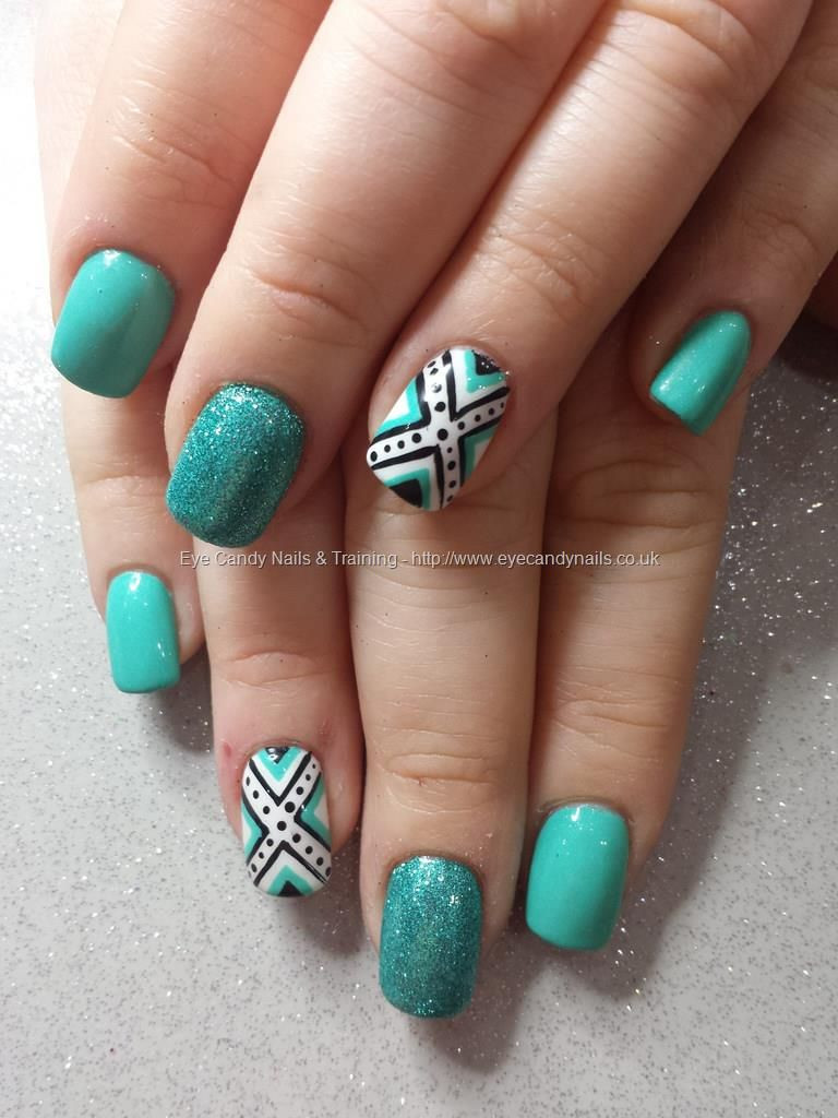 Mint Nail Designs
 Mint green gel with glitter and freehand nail art