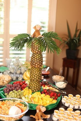Monkey Birthday Party Food Ideas
 Monkey Birthday Party Food table with pineapple palm