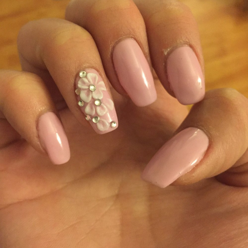 Nail Designs With Jewels
 Pink gels with white 3D nail art with jewels on natural