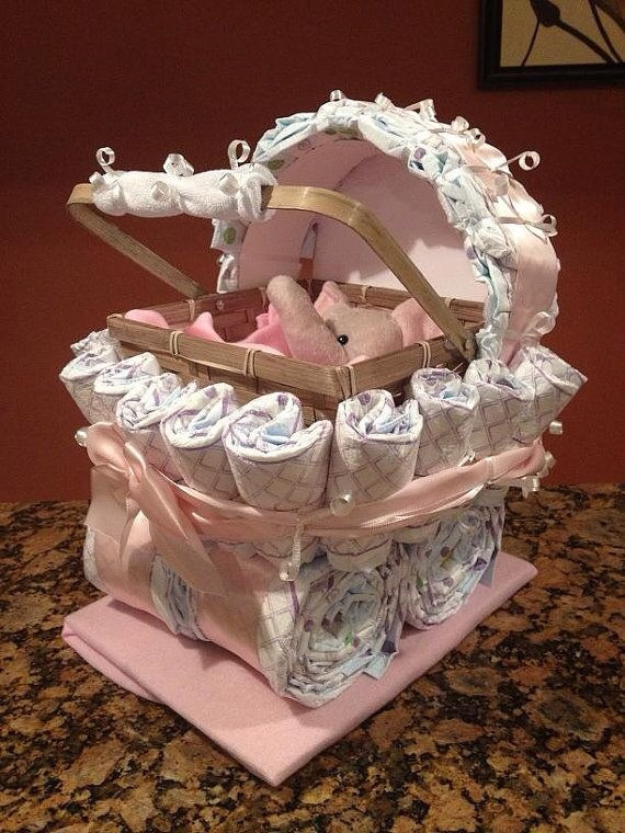 Neat Baby Gifts
 Diaper Carriage And Diaper Cake Unique Baby Shower Gifts