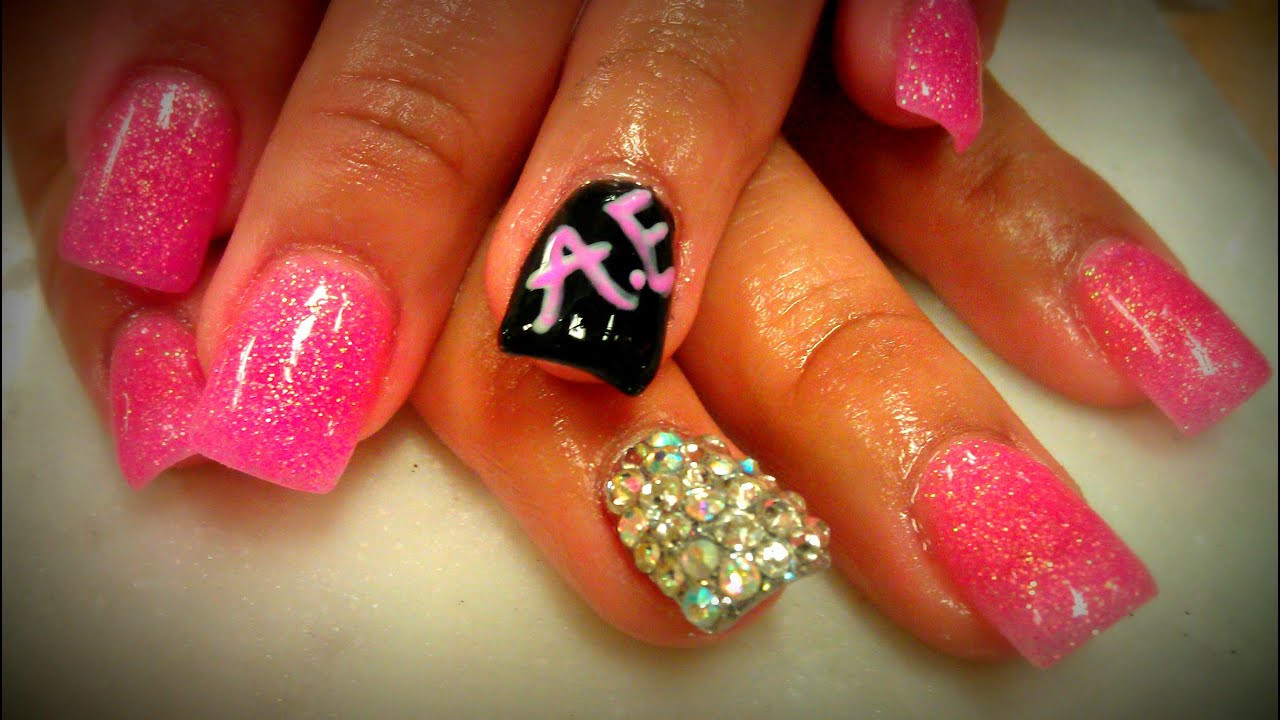 2. Neon Pink Glitter Acrylic Nails - wide 5
