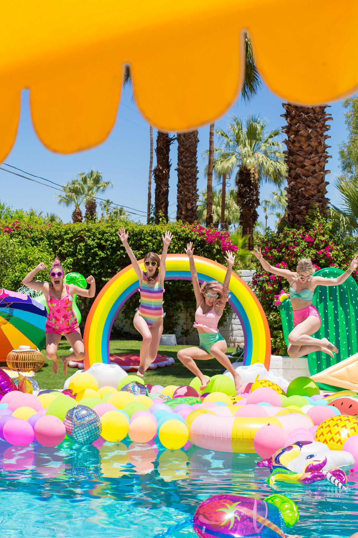 Pool Birthday Party
 An Epic Rainbow Balloon Pool Party Studio DIY