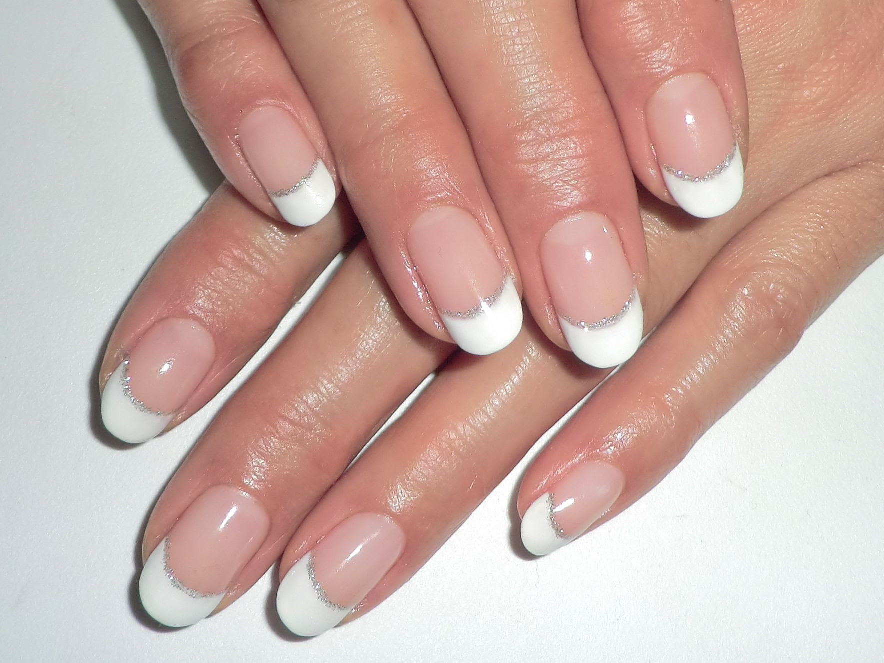 Round Tip Nail Designs
 Rounded French Tips With Silver Glitter Bands From Yucca