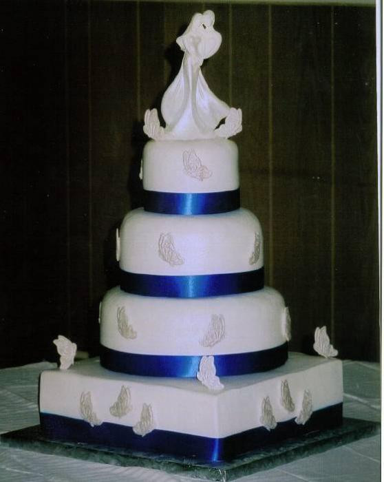 Royal Blue And Silver Wedding Cakes
 Cesley s blog A very classy white wedding cake adorned