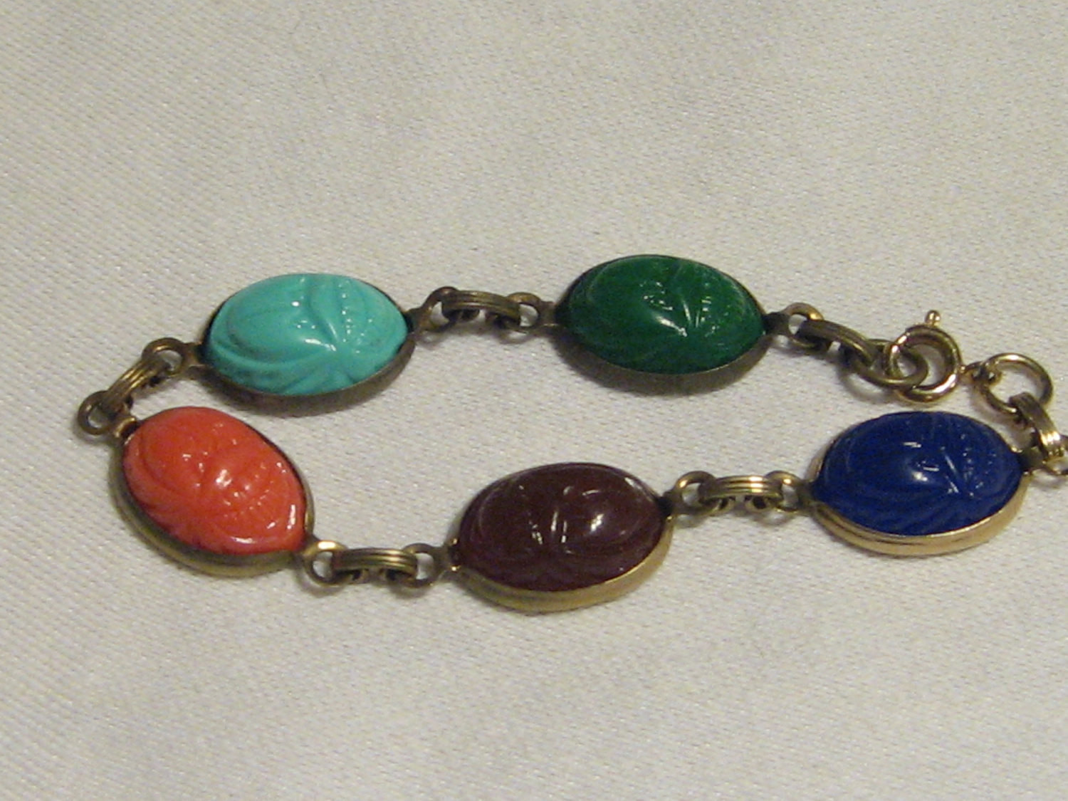 Scarab Bracelet Vintage
 Vintage Scarab Bracelet Lucite Carved Beetles 1960s