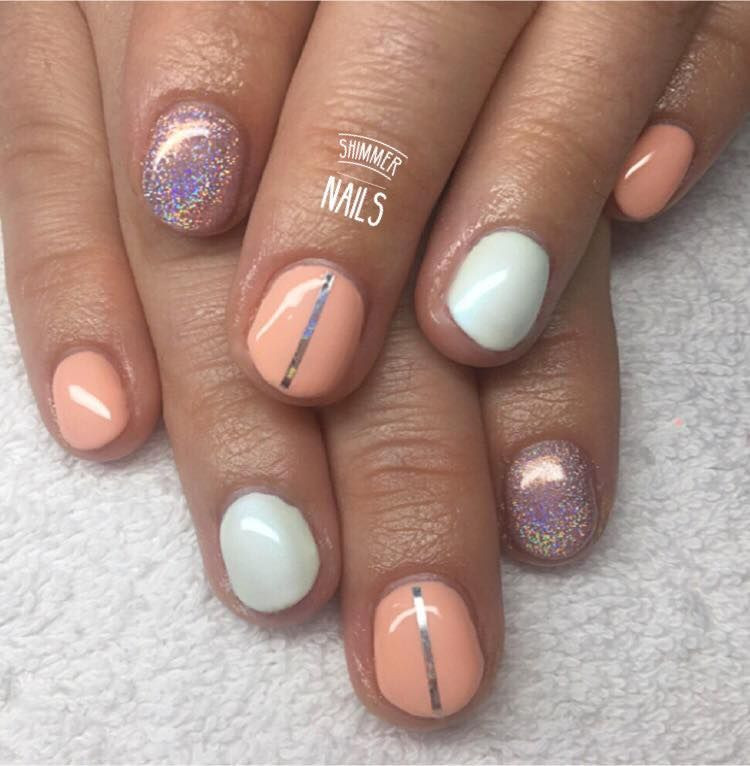 Short Round Nail Designs
 Silver white peach holographic nails Short round nails