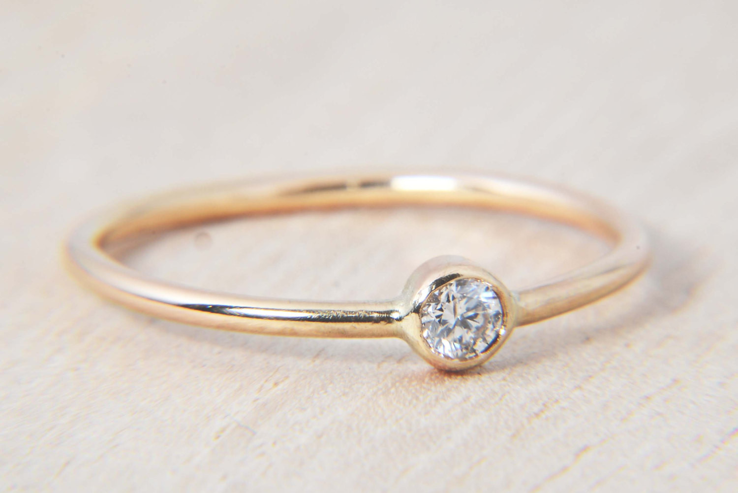 Small Diamond Rings
 Simple 11ct Diamond Ring in 14K Gold