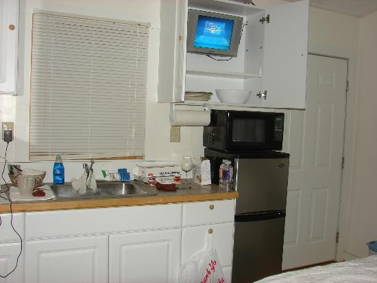 Small Kitchen Tv
 Small flat screen TV tucked away in a kitchen cabinet