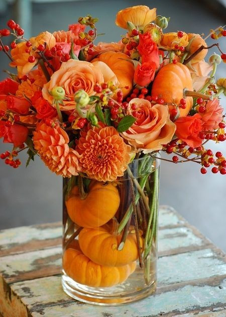 Thanksgiving Flower Arrangements
 Thanksgiving Centerpiece With Orange Flowers & Pumpkins