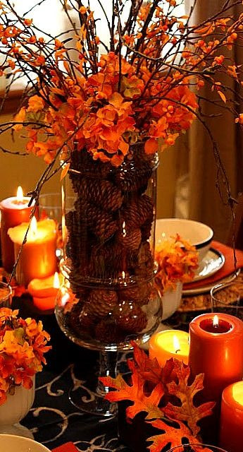 Thanksgiving Table Decorations Pinterest
 Leaves and orange candles make for the perfect intimate